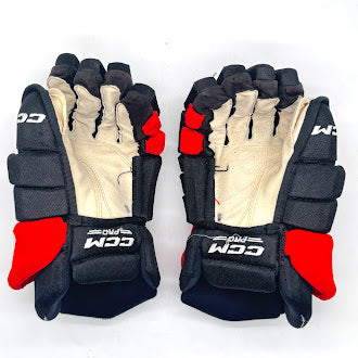 CCM HGTK - Gant NHL Pro Stock d'occasion - Eric Robinson (noir/rouge)